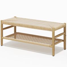 a wooden bench with wicker underneath it