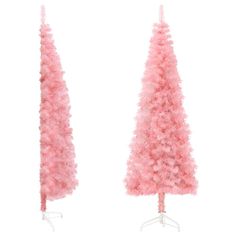 two pink christmas trees on white stands