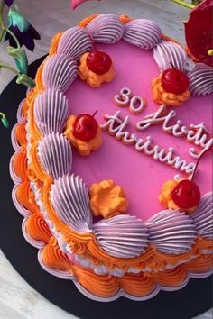 there is a birthday cake with the words 90th anniversary written in frosting on it