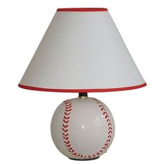 a baseball lamp with a white base and red stitching on the ball underneath it