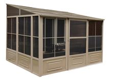 a large screened porch with windows and shutters on the sides, along with an awning