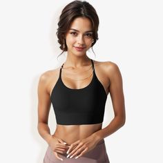 The Anna-Kaci Women's Low Impact Strappy Sports Bra with Lightweight Breathable Fabric and Seamless Finish is the perfect blend of style and comfort for your low-impact workouts. Crafted from soft, breathable fabric, this sports bra features a seamless design that ensures maximum comfort and a smooth fit against your skin. The strappy back adds a touch of elegance while providing adequate support for activities like yoga, pilates, or walking. The lightweight construction makes it ideal for layer Strappy Sports Bras, Racerback Sports Bra, Low Impact Workout, Bra Straps, Active Women, Active Wear For Women, Workout Tops, Large Black, Pilates