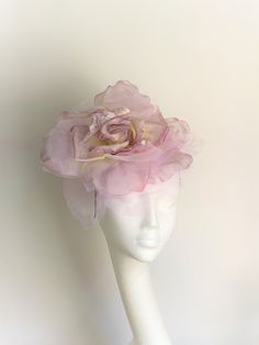 Large lilac lavender flower hat This amazing large lilac flower hat is made from organza and velvet fabric. The hat sits on the black fabric-covered headband to which I attached a comb so it will sit steadily on your hair. A large lilac flower hat will be an amazing accessory to compliment your outfit. It will fit the average head size. You can wear this amazing hat at the wedding, Christening, Horse races, and any other special occasion. Enjoy and please have a look in my shop for more hats and Cream Fascinator, Navy Fascinator, Blue Fascinator, Kentucky Derby Fascinator, Horse Races, Royal Ascot Hats, Derby Fascinator, Ascot Hats, Bride Hat