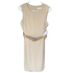 Beautiful New With Tags Never Worn Item! Color- Beige/ Tan Size 8 Zipper Back Calvin Klein Women’s Sleeveless Dress Zip Back Tan Khaki Size 8 New With Tags. Spring Fitted Belted Sleeveless Dress, Fitted Belted Sleeveless Dress For Spring, Calvin Klein Summer Work Dresses, Calvin Klein Summer Dresses For Workwear, Calvin Klein Summer Dresses For Work, Fitted Beige Sleeveless Dress For Work, Fitted Belted Sleeveless Summer Dress, Calvin Klein Sheath Mini Dress For Summer, Calvin Klein Summer Sheath Mini Dress