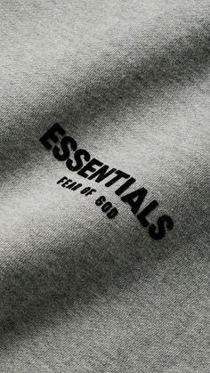 an image of the essentials logo on a t - shirt