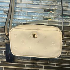 Tommy Hilfiger Bag White Bag Spacious Brand New With Tags Tommy Hilfiger Bags Handbags, White Cross Body Bag, Tommy Hilfiger Bag, Tommy Hilfiger Bags, White Cross, White Crosses, Cross Body Bag, White Bag, Body Bag