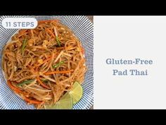 a plate filled with noodles and vegetables on top of a table