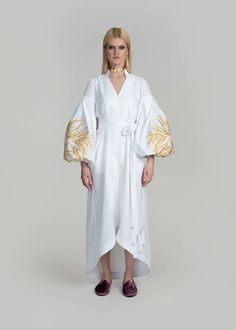 Luxurious White/Gold Kolossya Women's Midi Caftan Yuliya Magdych Festive Cotton Dress With Embroidered Sleeves, Elegant Summer Cotton Kaftan, Elegant Cotton Kaftan For Spring, Spring Cotton Kaftan With Floral Embroidery, Summer White Kaftan With Intricate Embroidery, Elegant Cotton Dress With Geometric Embroidery, Elegant Cotton Kaftan For The Beach, Elegant Cotton Beach Kaftan, Cotton Kaftan With Geometric Embroidery