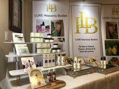 a table with various products on it at a beauty store, including lip balm and lotion