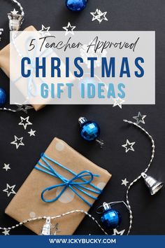 presents wrapped in brown paper and tied with blue ribbon on black background