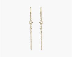 14K Yellow Gold Petite Lined Bar Diamond Earrings. Simple and elegant, these drop earrings featuring a delicate diamond lined bar hanging from a petite open xx making for the picture of understated glamour. Wear them to dress up your jeans and tee shirt or pair them with a cocktail dress for you next event. Understated Glamour, Subtle Tattoos, Earrings Simple, Arrow Necklace, Diamond Earrings, Tee Shirt, Cocktail Dress, Jewelry Earrings, Dress Up