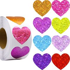 heart shaped glitter stickers are shown with different colors and shapes on the paper roll