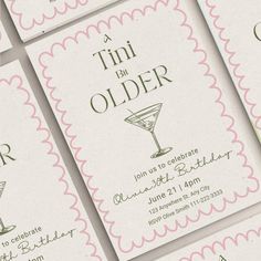 some pink and white business cards with martini glasses on them, all in different designs