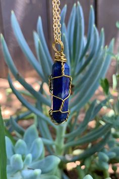 "Beautiful gold wire wrapped Lapis Lazuli quartz crystal point pendant on gold plated chain with lobster claw closure. The pendant is approximately 1.25\" long and 0.4\" wide. Please note that all crystals are unique and therefore color, shape and size may vary slightly. Please choose a necklace length from the drop-down menu. In case you would like a length other than the listed options, leave us a note at checkout. Item will be shipped 1 - 2 business days after purchase. \"Encourages self-awar Gold Wire Wrapped Crystal Pendant Necklace, Gold Wire-wrapped Pendant Crystal Necklaces, Gold Wire-wrapped Pendant Crystal Necklace, Gold Wire-wrapped Crystal Pendant Necklace, Gold Wire Wrapped Crystal Necklace For Gift, Boho Crystal, Quartz Crystal Necklace, Necklace Boho, Gold Wire