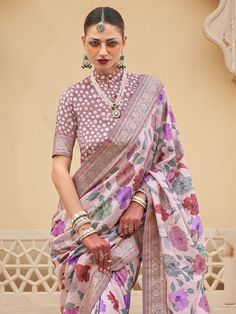 This fascinating baby pink floral printed silk traditional saree with blouse is a stunning choice for weddings, festivals, and other special occasions. The vibrant baby pink color of the saree, paired with the intricate floral print work and zari weaving, makes it a standout piece that is sure to turn heads wherever you go.
The saree comes with a matching light brown color silk blouse that also features printed work and zari weaving, adding to the overall elegance and charm of the ensemble. The Traditional Pre-draped Saree With Floral Print, Bollywood Style Festive Pre-draped Floral Saree, Traditional Fitted Pre-draped Saree With Floral Print, Pink Pre-draped Saree With Printed Motifs For Festivals, Floral Print Saree Set For Festive Occasions, Festive Fitted Saree With Floral Print, Festive Floral Print Saree Set, Pink Bollywood Pre-draped Saree For Transitional Season, Fitted Floral Print Saree For Festive Season