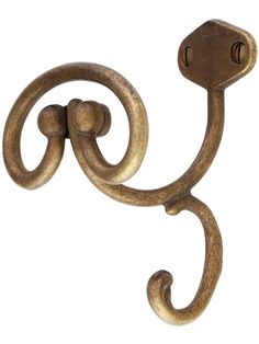 a metal hook with an intricate design on it