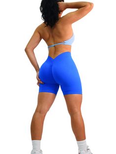 Description: Look on-trend during your workout with these Seamless V-Back Booty Shorts. Featuring a trendy butt scrunch and V-back waistband, these shorts guarantee the ideal fit for any body type. All of our leggings are made out of high quality nylon and spandex. Expect VERY comfortable, soft, and breathable fabric on your skin. Unlike cheap polyester leggings, these leggings do not slide down as you move and instead forms your figure all day. From shopping, working, going to classes and worki Blue Stretch Seamless Athletic Shorts, Blue Seamless Stretch Athletic Shorts, Blue Compression Seamless Shorts, Compression Seamless Blue Shorts, Seamless High-waisted Shorts For Gym, Seamless High-waisted Gym Shorts, High-waisted Workout Shorts With Seamless Construction, Fitted Blue Shorts With Seamless Construction, Blue Seamless Biker Shorts For Athleisure