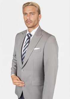 Discover timeless elegance with the Thompson Harbor Grey Blazer. Featuring a classic grey with a hint of color in a sharkskin weave, this luxury, custom-made jacket is a fashion-forward bespoke piece perfect for making a sophisticated impression. Classic Grey, Grey Blazer, Timeless Elegance, Bespoke, Fashion Forward, Custom Made, Blazer, Grey, Color