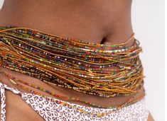 African finest hand made waist beads Bohemian Waist Beads For Beach, Bohemian Style Colorful Waist Beads, Beach Waist Beads With Tiny Beads, Bohemian Summer Festival Waist Beads, Bohemian Multicolor Waist Beads, Multicolor Waist Beads For Summer Festival, Colorful Waist Beads For The Beach, Bohemian Waist Beads For Summer Beach, Bohemian Waist Beads For Beach In Summer