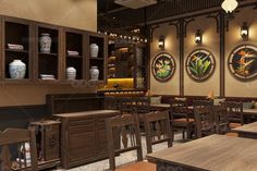 the interior of a restaurant with wooden tables, chairs and vases on the wall