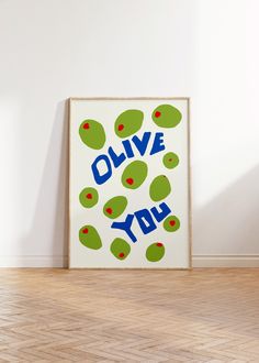 an art print with the words olive you in blue and green on a white background