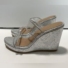 Kaanas Womens Hamburg Cork Wedge Sandal Shoe Silver Snake Clear Metallic Size 10 Never Worn 4.25inch Wedge Summer Synthetic Wedge Sandals With 4-inch Heel, Summer Beach Wedge Sandals With 4-inch Heel, Silver Synthetic Wedge Sandals For Summer, Silver Synthetic Heels For Beach, Silver Wedge Sandals For Summer, Silver Synthetic Wedge Sandals For Party, Silver Platform Sandals For The Beach, Summer Silver Platform Wedge Sandals, Silver Open Toe Wedge Sandals With Heel Loop