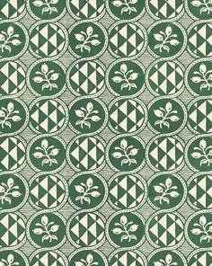 a green and white pattern with leaves on it