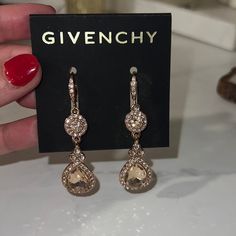 Givenchy Rose Gold Crystal Dangle Earrings Chic Rose Gold Earrings For Party, Rose Gold Dangle Earrings For Evening Bridal Wear, Rose Gold Dangle Bridal Earrings For Evening, Rose Gold Crystal Dangle Earrings For Evening, Rose Gold Drop Earrings For Party, Rose Gold Teardrop Crystal Earrings For Party, Rose Gold Drop Bridal Earrings For Party, Elegant Rose Gold Chandelier Earrings For Party, Rose Gold Dangle Chandelier Earrings For Party