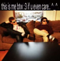 two people sitting on a couch with the caption'this is me btw 3 if even care '