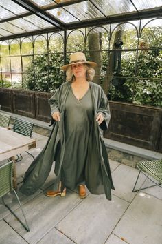 Expertly crafted from a luxurious blend of cotton and silk, INSTATE's Tea Leaf Kaftan boasts a long, oversized design with delicate fringes adorning the hem. With its unique cut, this kaftan features two wide front panels that can be elegantly draped around the neck and secured with matching fabric belts. Due to the dyeing process, slight variations in color, size, or shape may occur, adding to the one-of-a-kind charm of this garment. One Size Spring Kaftan With Tassels And Kimono Sleeves, Fall Vacation Tunic Kaftan, Fall Tunic Kaftan, Spring Tunic Kaftan With Tassels, Elegant Cotton Kaftan For Spring, Oversized Tunic Kaftan For Fall, Long Tunic For Spring, Spring Oversized Cotton Kaftan, Oversized Fall Tunic Kaftan