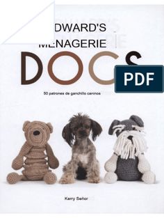 a book with three crocheted dogs sitting next to each other