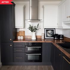 a black and white kitchen with wooden counter tops, cabinets, and an oven in the corner