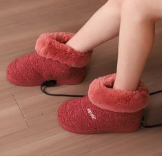 Keep your feet warm and toasty all winter long with these rechargeable heated slippers! With just a few hours of charging, you can enjoy hours of warmth, so you’ll never have to suffer through cold feet again. They’re perfect for indoor use, so you can keep your feet warm while relaxing at home. Heated Slippers, Shoe Dryer, Laundry Balls, Relaxing At Home, Baby Hug, Foldable Bed, Warm Winter Boots, Winter Slippers, Salon Style