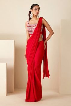 Red padded blouse with all over floral stripe pattern, contrast metallic zari, sequin and pearl hand embroidery. Paired with pre-draped saree with pleated draped panels and attached pallu. - Aza Fashions Red Silk Fitted Pre-draped Saree, Elegant Red Draped Blouse Piece, Red Traditional Drape Blouse For Evening, Kurta Sets For Women Online, Kurta Sets For Women, Draped Saree, Rani Pink, Pink Thread, Drape Saree