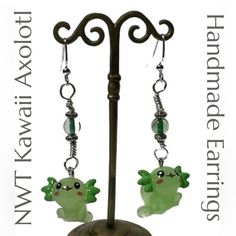 Handmade Artisan - Kawaii Axolotl Earrings - Green These Earrings Have Been Lovingly Hand-Crafted By Ali Cansler Of Second Chance Alley. These Adorable Earrings Are Kawaii Axolotl Earrings. They Are Approximately 2 1/2” Long. The Axolotl’s Themselves Have A 3/4” Long Body, Are 3/4” Wide At Fins And 1/2” Front To Back. Made With Stainless Steel Earring Hooks For Comfortable And Hypoallergenic Comfort. Add Flair To Any Outfit. Perfect Gift For That Special Person In Your Life. As Always, Each Pair Axolotl Earrings, Tiger Salamander, Kawaii Axolotl, Earring Cards, Earring Hooks, Second Chance, Stainless Steel Earrings, Special Person, Handmade Artisan