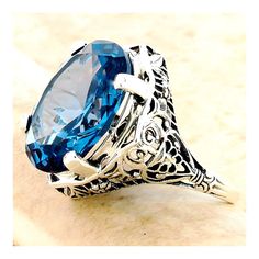 Vintage Estate 10 Carat London Blue Simulated Topaz Solitaire Filigree Ring. 925 Solid Sterling Silver. Stamped 925.  Excellent Condition/Like New. Ring Sizes 5-10 Filigree Ring, Blue Band, Ring Sizes, London Blue Topaz, London Blue, Solitaire Ring, Lovely Gift, Blue Topaz, Beautiful Rings