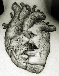 the back of a man's neck with a drawing of a human heart on it