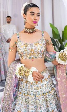 Indian Bridal White Multi Lehenga Choli Dress is a decorated clothing that will give you a head-turning look on the eagerly awaited day to have a head-turning mysterious look. Sumptuous plans and hand-worked subtleties make this Wedding Lehenga Choli an encapsulation of excellence.
For more details contact us on our WhatsApp 
+1 (732) 351-5426
Visit our website 
www.nameerabridal.com
#bridaldressonline #bridaloutfit #usabridalgown #usabridaldress #onlinebridaldress #pakistaniwedding   #pakistani Strappy Blouse, White Lehenga Choli, Nomi Ansari, White Lehenga