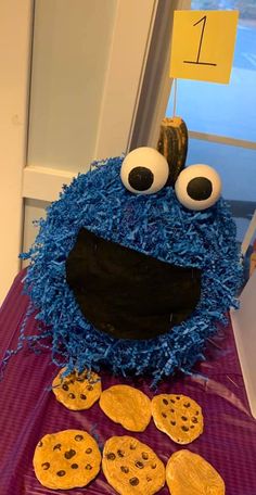 cookie monster made out of cookies sitting on a table