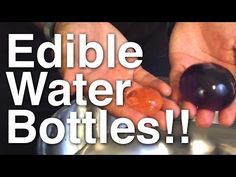 two hands are holding an object in front of the words edible water bottles on a metal tray