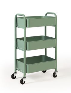 a green cart with three shelves and wheels on the bottom shelf is shown in front of a white background