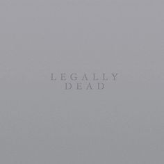 the words legally dead are written in white on a gray background