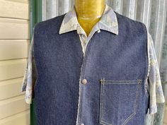 Retro and rugged, this vintage 70's vest will keep you cosy, while looking cool. Made from a dark blue denim with a soft, faux-shearling lining. This vest has snap button closure, two wide pockets with snap fastening and a patch breast-pocket.  The perfect layering piece to add some western flair to your outfit.  Size Extra Large Measurements: Chest: 117 cm / 46 inches Length: Front 66 cm / 26 inches                 Back  70cm / 27.5 inches  This item is one of a kind. BUYING VINTAGE: While all care is taken to state any obvious faults, please note that when you buy a vintage or preloved item, they may show small signs of ageing, wear and/or repair. Visit my website   https://phoenixmenswear.com.au/ Lots of fun stuff for guys and girls...!! Please note that if you are ordering from anywher Casual Upcycled Sleeveless Denim Vest, Vintage Upcycled Denim Outerwear, Retro Denim Vest For Fall, Casual Upcycled Vest, Casual Upcycled Sleeveless Vest, Vintage Dark Wash Cotton Vest, Vintage Vest With Pockets In Dark Wash, Vintage Dark Wash Denim Vest, Vintage Denim Blue Vest With Pockets