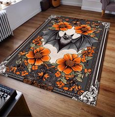 a bat with orange flowers is on the floor