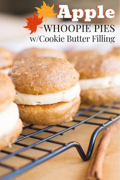 an apple whoopie pies with cookie butter filling are on a cooling rack