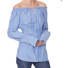 This Striped Off-The-Shoulder Shirt Has A Flattering, Shirred Neckline And Elastic Details In The Front And Back That Minimize The Waist. A Center Tie At The Neck, Chest Pocket, And Cuffed Sleeves Further Update This Crisp Cotton Style. Unlined. 100% Cotton Style Number:F17gs75202 Available In:Blue/Red Multi, Blue/Navy Multi Blue Long Sleeve Off-shoulder Top For Spring, Blue Long Sleeve Off-shoulder Top For Summer, Blue Off-shoulder Long Sleeve Top For Summer, Casual Off-shoulder Blouse For Work, Casual Off-shoulder Workwear Top, Casual Off-shoulder Top For Work, Casual Off-shoulder Blouse For Daywear, Emerald Green Blouse, Red Camisole