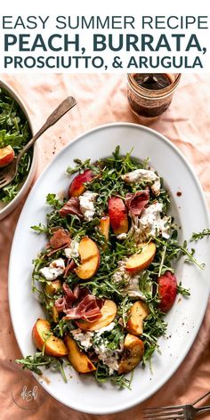 a white plate topped with salad and peaches