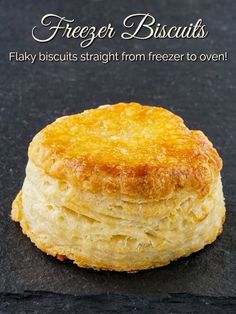 a close up of a pastry on a black surface with the title freezer biscuits flaky biscuits straight from freezer to oven