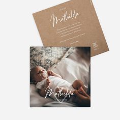 the birth announcement card is printed on brown paper and features a photo of a baby