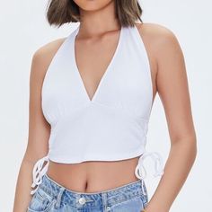 Plunging White Halter Top With Tie Up Sides From Forever 21 Size L Large. Brand New Never Worn. The Top Was Too Big For Me. A Knit Crop Top Featuring A Plunging Halter Neckline And Ruched Drawstring Sides. #Forever21 #Haltertop #White #Whitetop #Croptop Chic Low-cut Halter Top For Summer, Chic Low-cut Halter Top For Spring, Trendy Low-cut Tank Top For Summer, Trendy Low-cut Summer Top, Spring Low-cut Halter Top For Beach, Low-cut Halter Top For Beach In Spring, White Low-cut Crop Top For Spring, Spring Beach Tops Low-cut, Low-cut Beach Tops For Spring